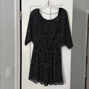 Gemma - Chic Black and White Polka Dot Mini Dress
